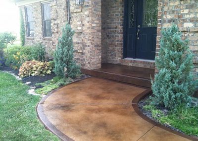 Stained concrete sidewalk with decorative border in Jacksonville, FL